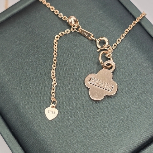 CHANEL Gold and Black Clover Necklace - Picture 3 of 3